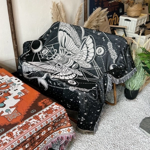 Bohemian jacquard woven picnic blanket with mystical moon phase pattern and tassels