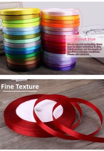 Macro detail of 6mm satin ribbon rolls in multiple colors on dark wood surface