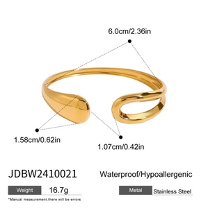 Detail view of 18k gold-plated stainless steel teardrop bangle with dimensions and features