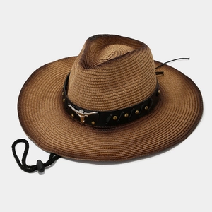 Western straw cowboy hat with a metal bull head emblem and adjustable chin strap