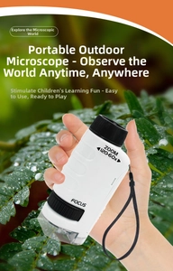 Detail of 60-120x portable microscope for kids focusing on a green leaf outdoors
