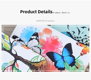 Close-up of leather wallet featuring floral butterfly prints and precise stitching details