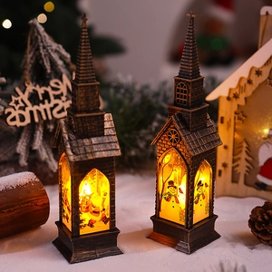 Close-up of retro church-style Christmas lantern with warm LED light and Santa snowman prints