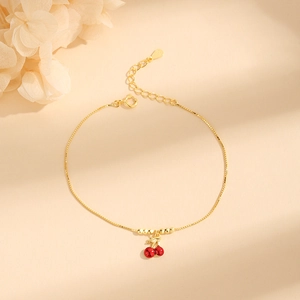 S925 sterling silver cherry charm bracelet in gold finish with adjustable lobster clasp
