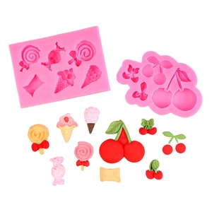 Pink silicone mold set for cherry and lollipop candy shapes used in cake decoration