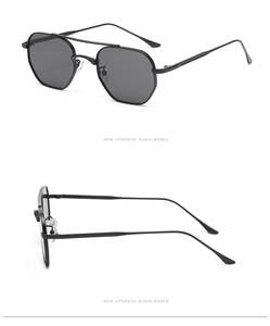 Detail of classic black metal pilot sunglasses with double bridge and slim temples