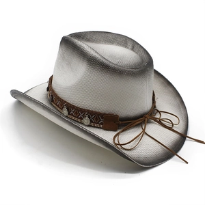 Detail view of woven western cowboy straw hat with gradient color and vintage charms