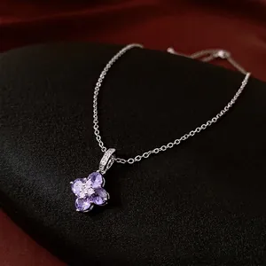 Elegant silver necklace featuring a purple zircon flower pendant with a sparkling center