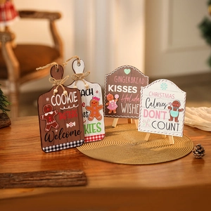 Wooden gingerbread man welcome sign set with festive ornaments for Christmas home decor