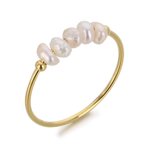 Elegant gold titanium steel ring with five white freshwater pearls on white background