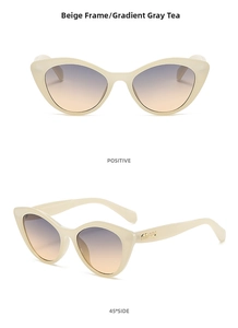 Detail view of beige cat-eye sunglasses featuring gradient lenses and metal temple logo