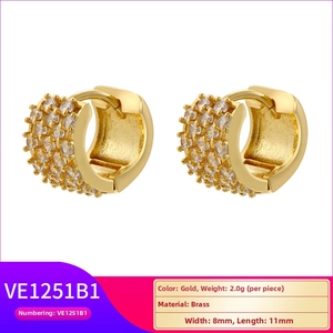 Detail view of gold brass earrings with pave zircons showing 8mm by 11mm size and 2g weight