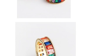 Macro shot of colorful baguette zircons in a gold setting with seamless pavé craftsmanship