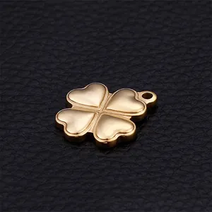 Polished gold-plated stainless steel four-leaf clover pendant with heart-shaped leaves