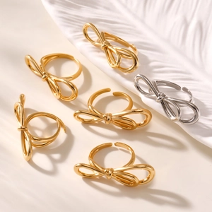 Adjustable minimalist stainless steel bow rings in gold and silver finish set