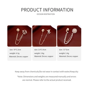 Detailed views of 14K gold plated Saturn and star brooches with cubic zirconia and pearls