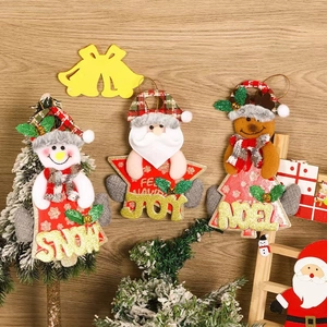 Three festive Christmas plush ornaments featuring Snowman, Santa, and Reindeer on wood
