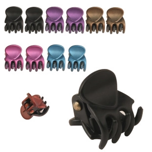 Close-up of colorful matte plastic small hair claws for children styling
