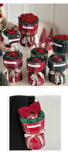Close-up of British plaid fabric and white fleece packaging for Christmas flower gift boxes