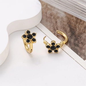 18k gold plated stainless steel floral hoop earrings with six black gemstones set in gold