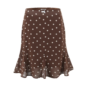 Retro brown polka dot skirt with white bow and ruffled mermaid hem on white background