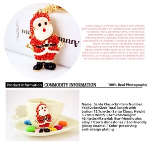 Detail view of Santa Claus keychain showing rhinestone inlay and enamel craft dimensions