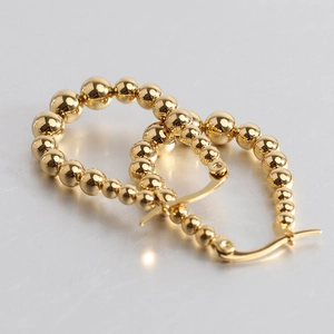 Polished 18K gold-plated stainless steel U-shaped beaded hoop earrings for women
