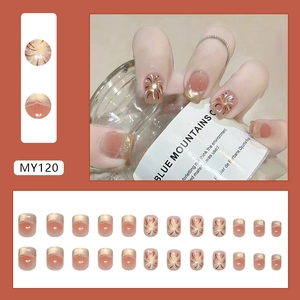 Faux ongles œil de chat avec motif feu d'artifice français en marron rouge et doré