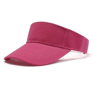 Close-up of the rose pink sun visor with detailed cotton twill texture and stitching