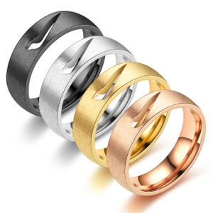 Detail of four-color braided stainless steel rings with sleek cutout designs and brushed finish