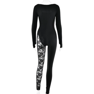 Detail view of back side lace patchwork and slim fit silhouette on black long sleeve bodysuit