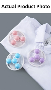 Three colorful laundry floating filter net bags placed on a white shirt for hair removal.