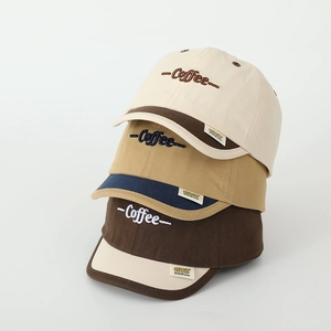 Detailed view of color-block baseball caps featuring 3D Coffee embroidery and cotton twill