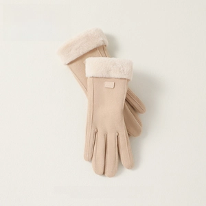 Close-up of warm winter gloves with faux fur cuffs and thermal fleece lining interior