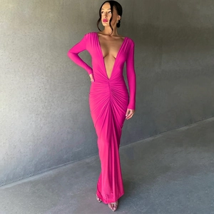 Detail of a magenta V-neck slim-fit dress featuring elegant waist pleats and long sleeves