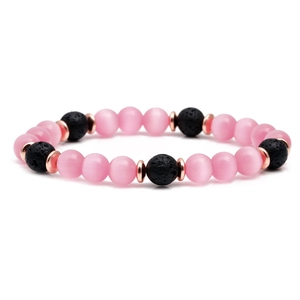 Bracciale in pietra lavica e occhio di gatto rosa con eleganti distanziali in oro rosa