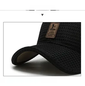Detailansicht der atmungsaktiven schwarzen Mesh-Cap mit EDIKO-Label und Schirm