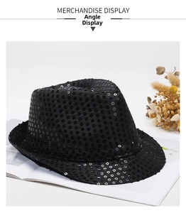Detail of a stylish black sequin jazz hat featuring shiny finish and elegant satin ribbon
