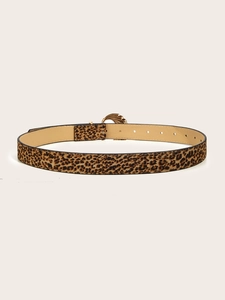 Detail of leopard print belt with golden metal buckle and beige leather lining