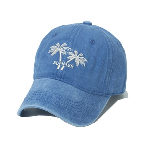 Detailed embroidery of white coconut palm tree and SUMMER text on navy washed cotton cap