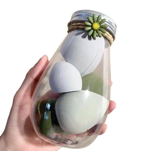Soft makeup sponge set in transparent tea bottle with cute green daisy decoration