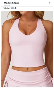 Close-up of peach pink halter yoga vest with breathable fabric and slim fit design