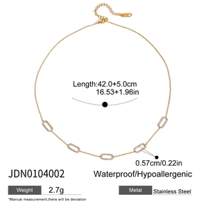 Detail view of gold 18K stainless steel oval pendant necklace with product specifications