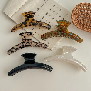Set of five French leopard print hair claws in tortoiseshell and solid colors