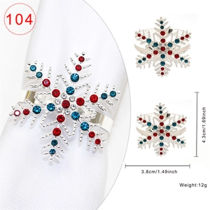 Silver snowflake napkin ring with red and blue rhinestones for Christmas table decor