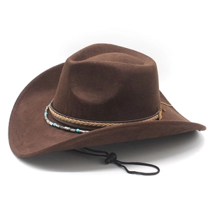 Detail of western suede cowboy hat featuring turquoise beads and ethnic woven band