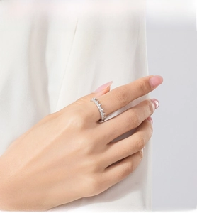 Close-up of S925 silver crown ring with micro-pave cubic zirconia on model's finger