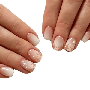 Short gradient white Christmas press-on nails featuring elegant brown snowflakes and stars