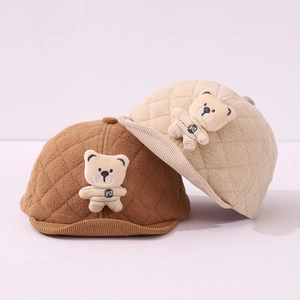 Quilted warm baby winter hats with teddy bear doll in brown and beige colors