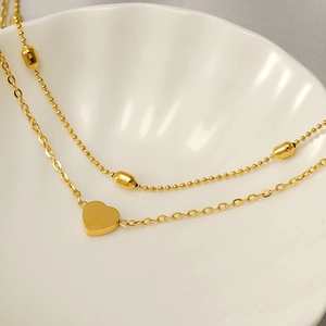 Double-layer 18K gold-plated stainless steel heart pendant anklet on decorative shell